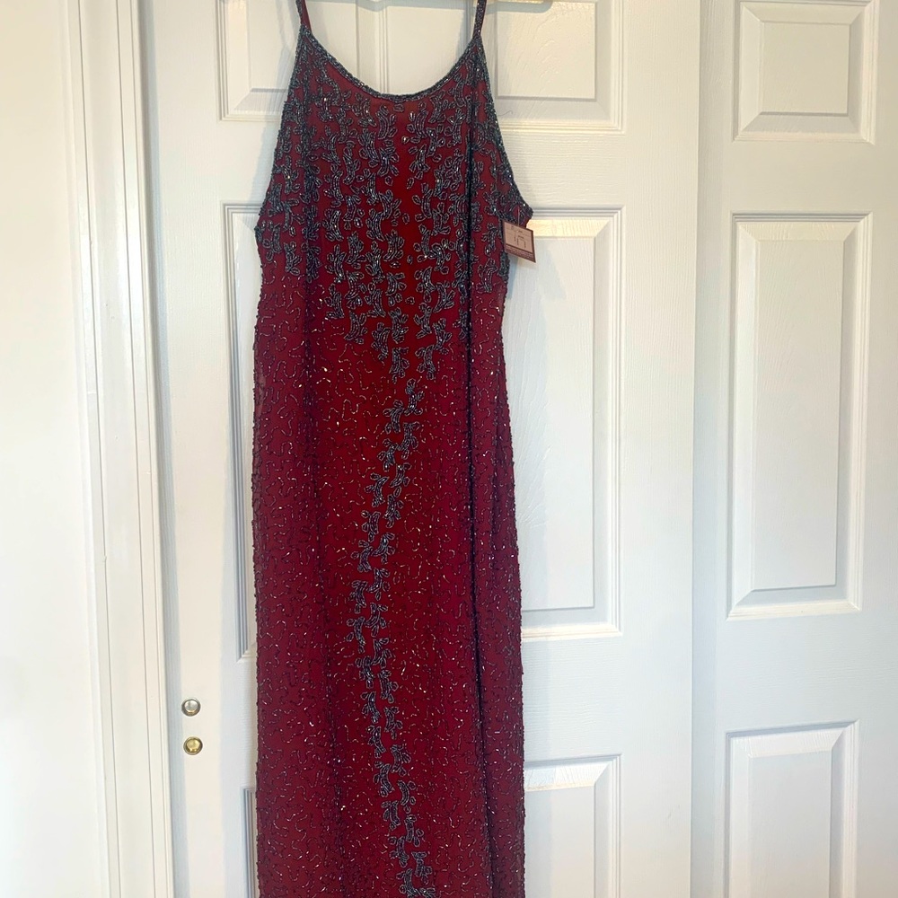 Beautiful full length beaded gown.